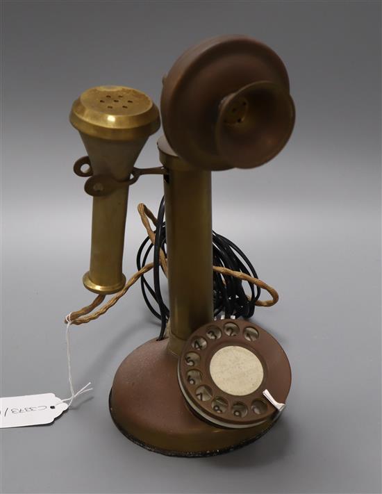 A brass stick telephone